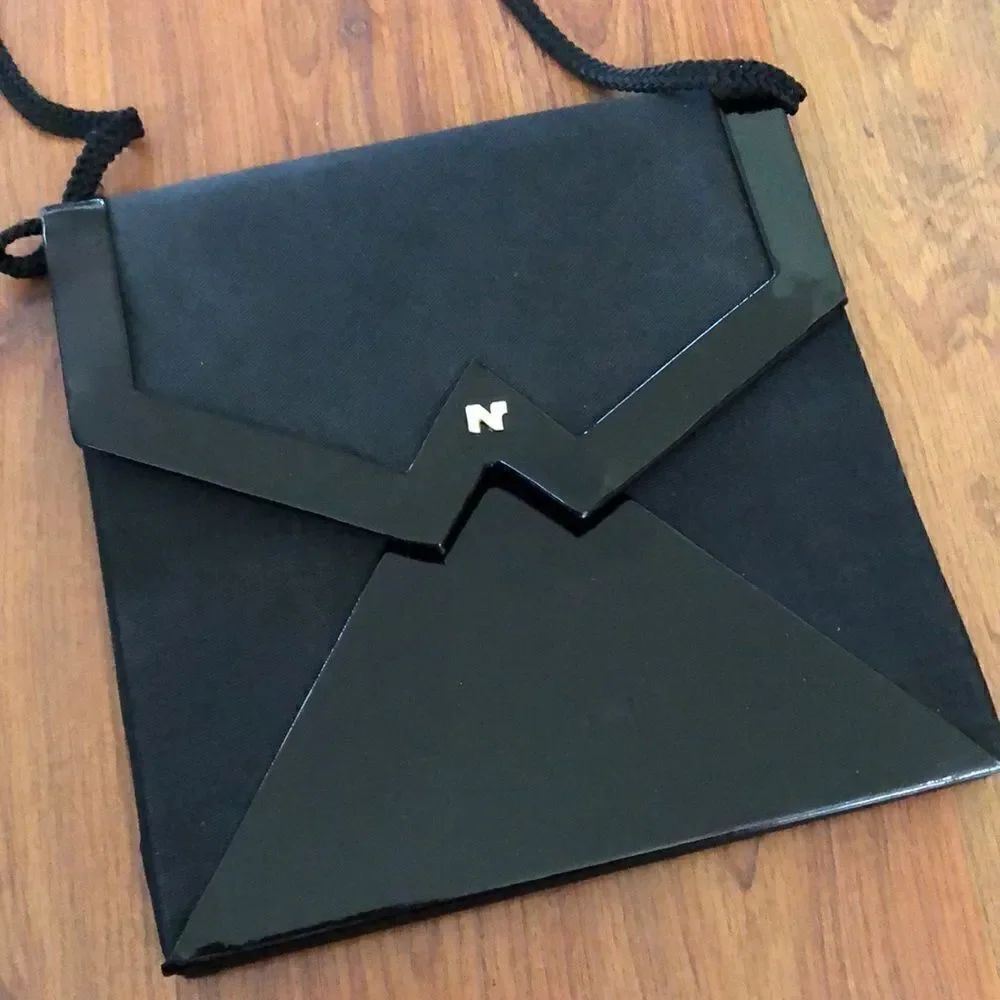 Nina Ricci Paris Vintage black patent leather envelope handbag.